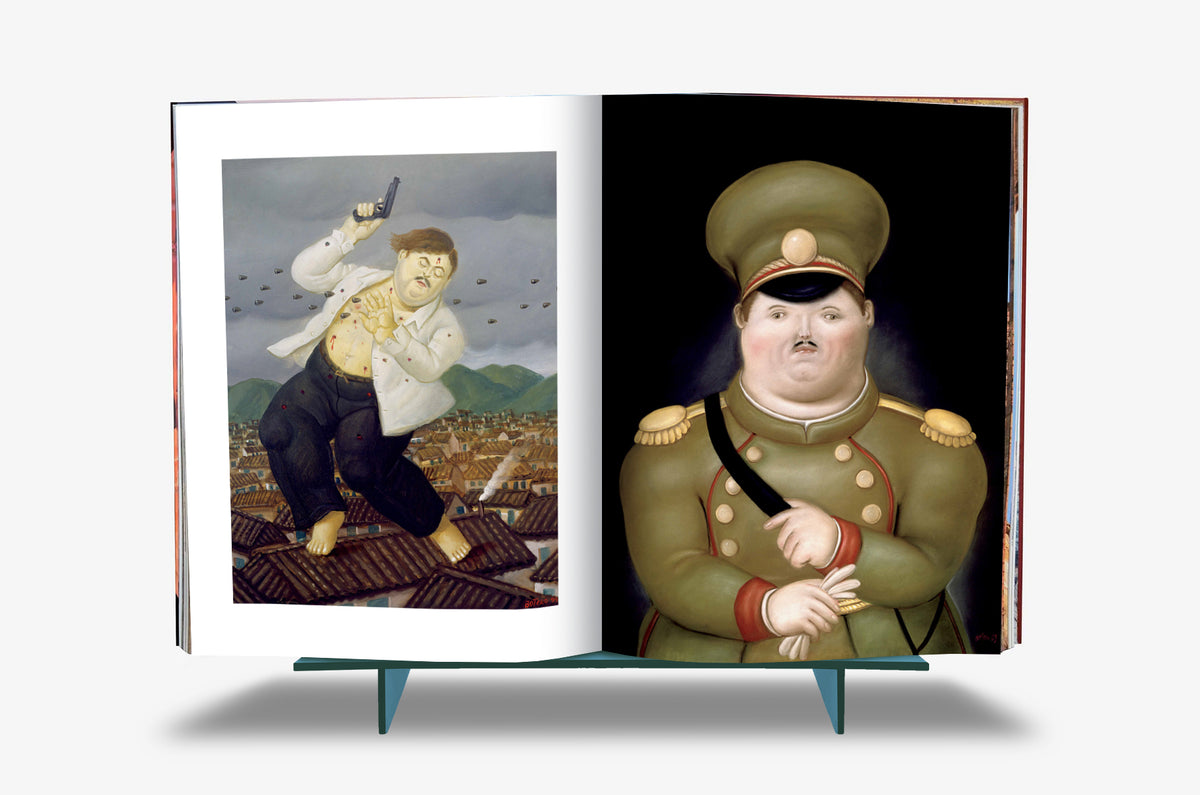 Fernando Botero XXL by Assouline: Book open to two paintings — a dramatic assassination scene on the left, a rotund figure falling against a rooftop city scape; a stern military general in olive uniform and medals stands arms-crossed on the right, against a dark background.